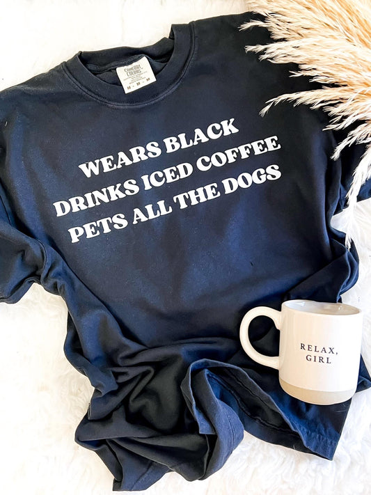 Wears Black, Pets Dogs